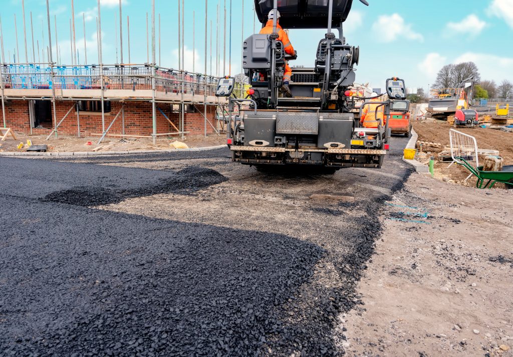 tarmac truck laying road